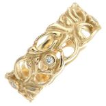 A 14ct gold diamond floral band ring,