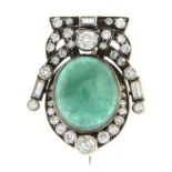 A mid 20th century silver and gold emerald cabochon and diamond brooch.Emerald calculated weight