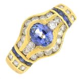 A sapphire and diamond dress ring.Total diamond weight 0.67ct,