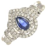 An 18ct gold sapphire and diamond cluster ring.Sapphire weight 0.43ct,