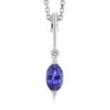 An 18ct gold tanzanite and diamond pendant,