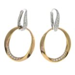 A pair of bi-colour diamond dress earrings.Total diamond weight 0.26ct.Length 2cms.