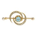 A zircon and split pearl brooch.Length 4.3cms.