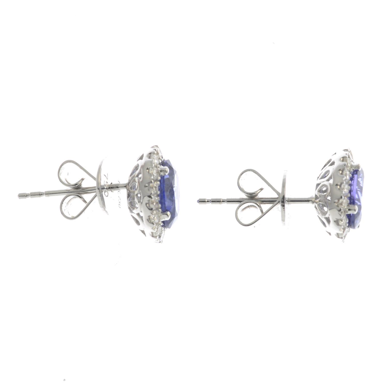 A pair of sapphire and diamond cluster earrings.Total sapphire weight 1.95cts. - Image 2 of 2