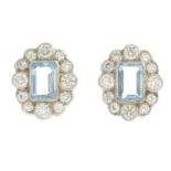 A pair of aquamarine and diamond cluster earrings.Estimated total diamond weight 0.70ct,