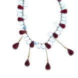 An 18ct gold topaz and ruby fringe necklace,