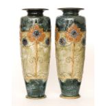 A large pair of Royal Doulton stoneware vases decorated by Maud Bowden,