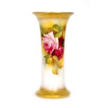 A Royal Worcester shape G923 trumpet vase decorated by Millie Hunt with hand painted roses, signed,