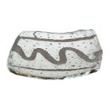 A later 20th Century David Frith studio pottery square dish raised to four hoop feet,