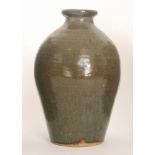 A St. Ives studio pottery stoneware vase, glazed in dark brown, impressed mark, height 28cm.