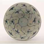 An early 19th Century Chinese Tek Sing Cargo bowl in underglaze blue and white with a repeat