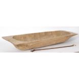 A carved softwood trough,