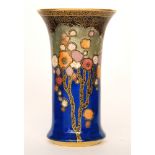 A 1930s Crown Devon Art Deco vase of flared cylinder form decorated in pattern 2073 with gilt and