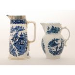 A late 18th Century Caughley leaf moulded mask spout water jug decorated in the blue and white
