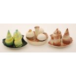 Three assorted novelty Carlton Ware cruet sets comprising two formed as shells and one as a