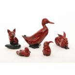 Five assorted Royal Doulton Flambe animals comprising a fox, rabbit, two ducks and a hare,