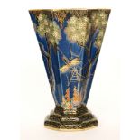 A 1930s Crown Devon Art Deco trumpet vase of fluted form decorated with gilt and enamel spider's