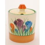 A Clarice Cliff Crocus pattern cylindrical drum preserve pot circa 1950 hand painted with crocus