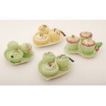 Four assorted 1930s / 1940s Carlton Ware embossed cruet sets comprising two apple blossom (one