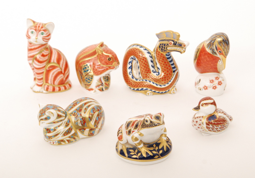 Seven assorted Royal Crown Derby paperweights comprising two cats (one marked as a second),