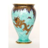 A 1930s Crown Devon Art Deco Mattajade vase of footed form decorated with a gilt and enamel