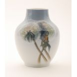 A small Royal Copenhagen vase of spherical form decorated with dandelion clocks over a pale blue