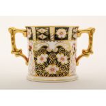 A later 20th Century Royal Crown Derby twin handled loving cup decorated in the Imari 2451 pattern,