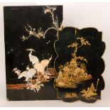 A 19th Century Japanese shibyama lacquered panel decorated with storks below a fruiting bough and