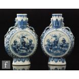 A pair of Chinese Kangxi style blue and white moonflasks, late Qing Dynasty (1644-1912),