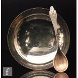 An early 20th Century Danish Georg Jensen sterling silver spoon in the Akkeleje pattern,