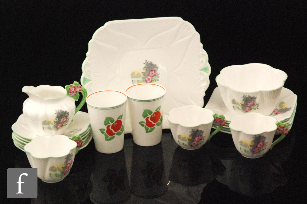 A small collection of assorted 1930s Shelley teawares comprising three Dainty shape teacups with