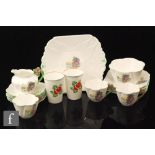 A small collection of assorted 1930s Shelley teawares comprising three Dainty shape teacups with