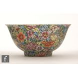 A Chinese Millefleur style bowl of 'U' form, raised on high footring,