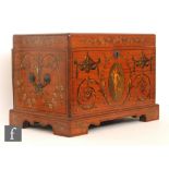 An early 20th Century crossbanded satinwood collectors cabinet or jewellery box with twin carry