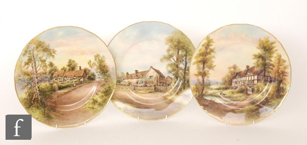 Three Royal Worcester cabinet or wall plates comprising one decorated by Rushton with a scene of