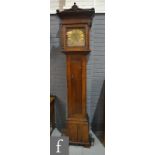 An early 19th Century and later converted oak longcase clock with thirty hour movement,