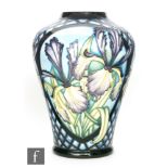 A Moorcroft Pottery vase decorated in the Siberian Iris pattern designed by Sian Leeper,