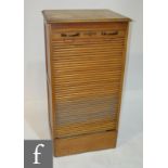 An early 20th Century oak tambour fronted filing cabinet, height 113cm,