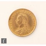 A Victorian shield back half sovereign dated 1887.