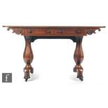 A 19th Century rosewood library or writing table,