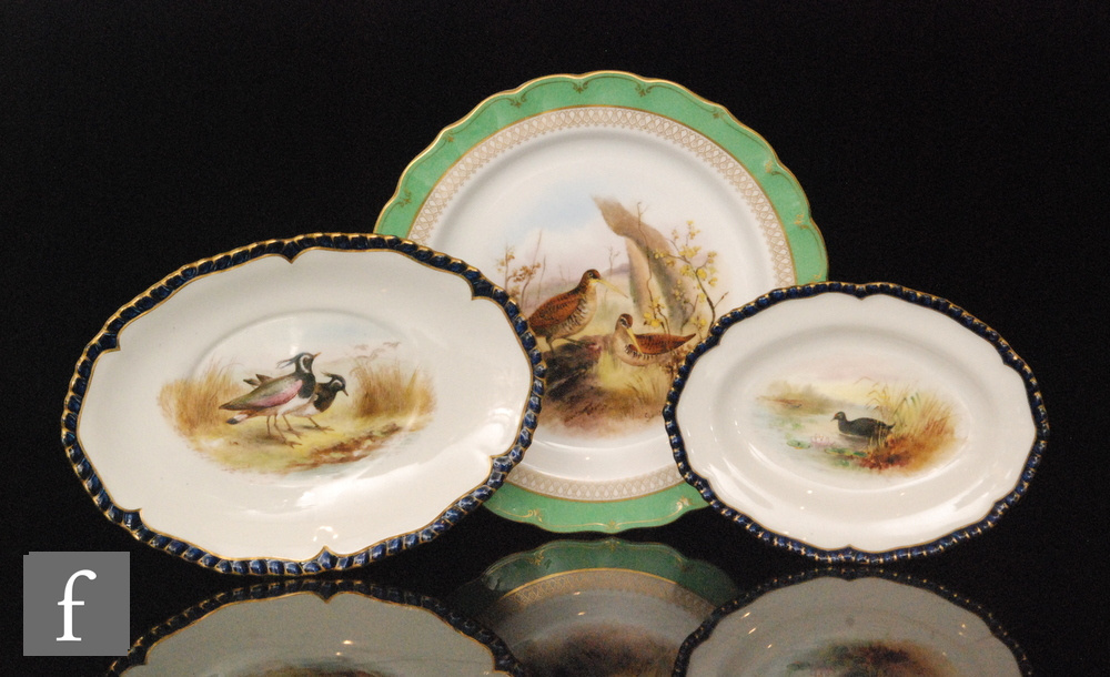 A Royal Worcester cabinet plate decorated to the central well with two woodcock birds by S.