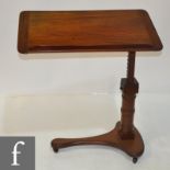 A Victorian mahogany adjustable reading table of rectangular form,