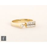 A modern 18ct diamond ring,