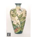 A Moorcroft Pottery vase of high shouldered form decorated in the Garden Fruit pattern designed by