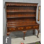 An 18th Century style oak dresser and rack,