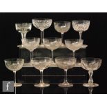 A group of eleven assorted 19th Century and later champagne glasses each with various decoration