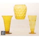 A 1930s Thomas Webb and Sons uranium golden amber vase, optic moulded with a repeat spot design,