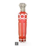 A Continental silver and cranberry glass tapering cylindrical scent bottle with white overlaid