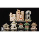 Eight assorted late 19th to early 20th Century Staffordshire pastel burners modelled as turreted