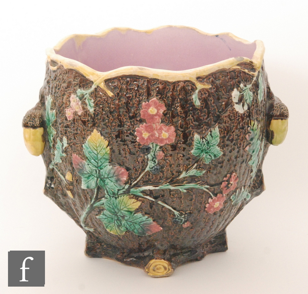A 19th Century majolica jardiniere relief decorated with flowers and foliage against a textured - Image 2 of 2